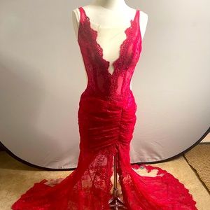 ONE OF A KIND! Red lace and sequin ball gown with neck line and train.
